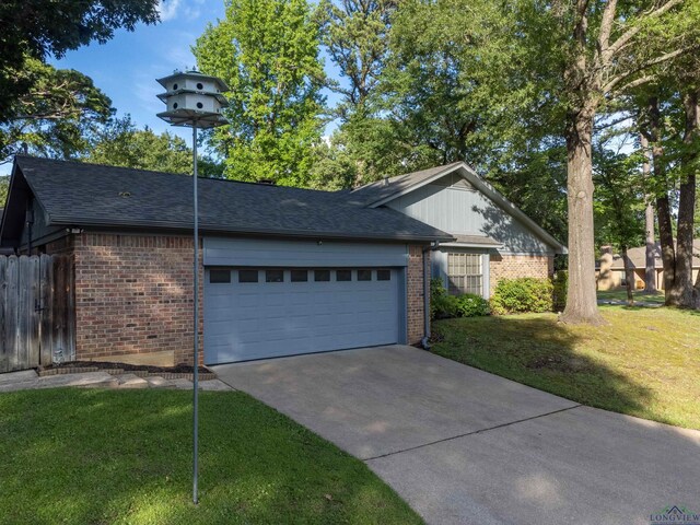 1317 Tiffany Ln, Longview, TX 75604 - view of property exterior featuring brick siding, concrete driveway, an attached garage, and a shingled roof