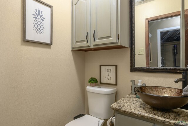 1317 Tiffany Ln, Longview, TX 75604 - bathroom with vanity and toilet