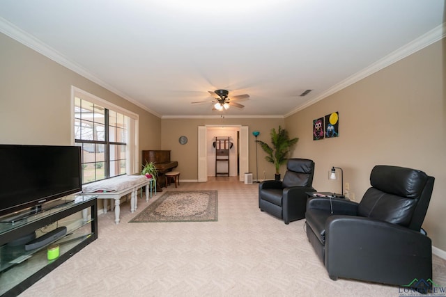 living area featuring a ceiling fan, light colored carpet, baseboards, and ornamental molding