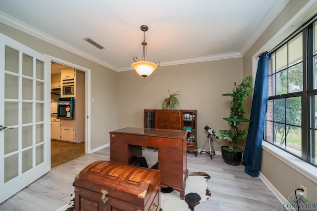 office area featuring crown molding, visible vents, and a wealth of natural light