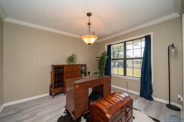 office area with crown molding, light wood-style floors, and baseboards