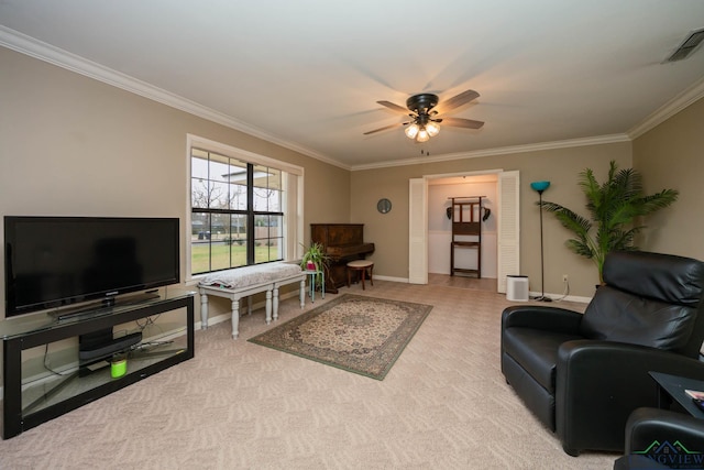 living area with carpet, baseboards, visible vents, ceiling fan, and crown molding