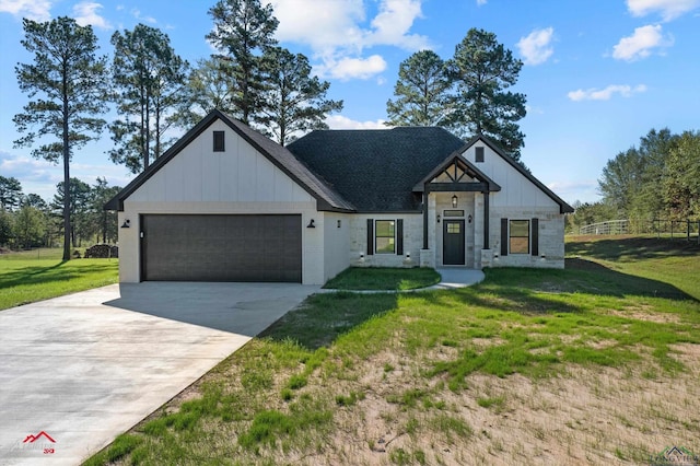 modern inspired farmhouse featuring a front yard and a garage