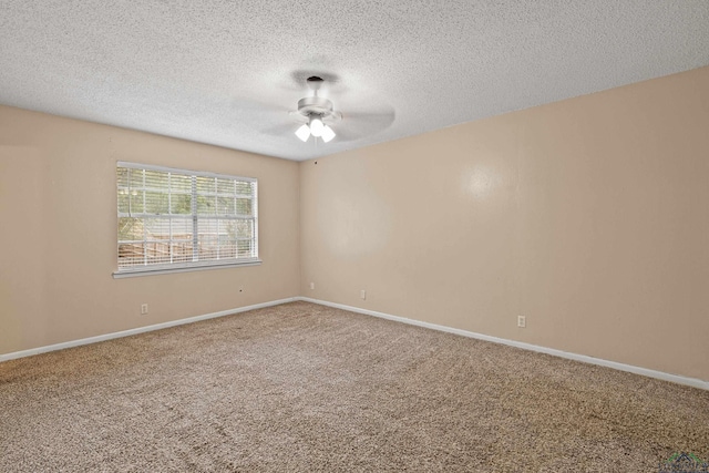 unfurnished room featuring carpet flooring, ceiling fan, and a textured ceiling