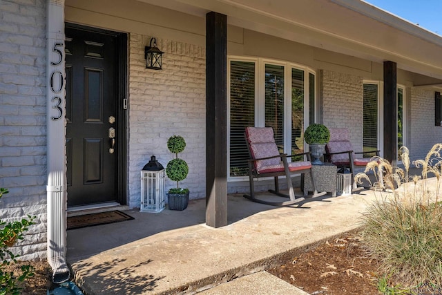 entrance to property with covered porch