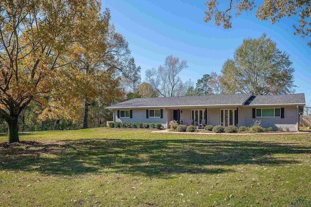 ranch-style house with a front lawn