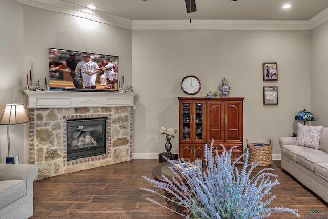 1624 Olympic Dr, Longview, TX 75605 - living area featuring ornamental molding, ceiling fan, a stone fireplace, wood finished floors, and recessed lighting