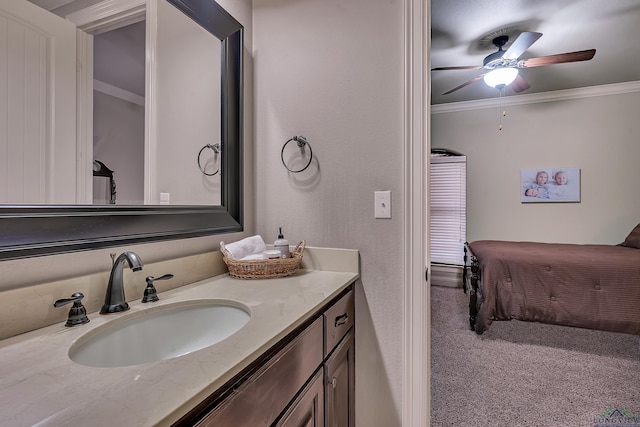 1624 Olympic Dr, Longview, TX 75605 - bathroom featuring ornamental molding, vanity, and ceiling fan