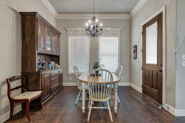 1624 Olympic Dr, Longview, TX 75605 - dining area with a chandelier, dark wood-type flooring, healthy amount of natural light, baseboards, and ornamental molding