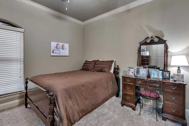 1624 Olympic Dr, Longview, TX 75605 - bedroom featuring light carpet, ornamental molding, and baseboards