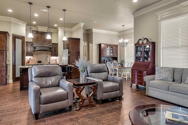 1624 Olympic Dr, Longview, TX 75605 - living area with a chandelier, dark wood-type flooring, recessed lighting, and ornamental molding
