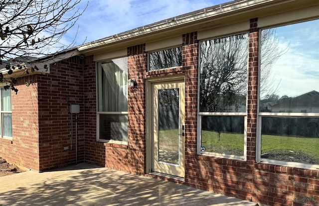 doorway to property featuring a patio