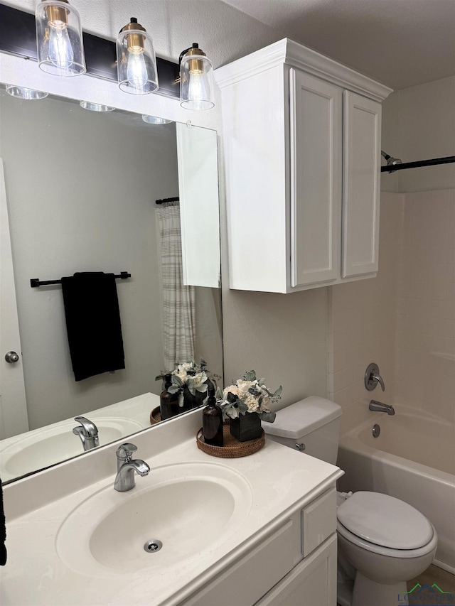 full bathroom featuring toilet, vanity, and shower / bath combination with curtain