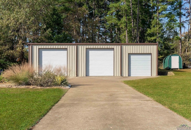 garage with a yard