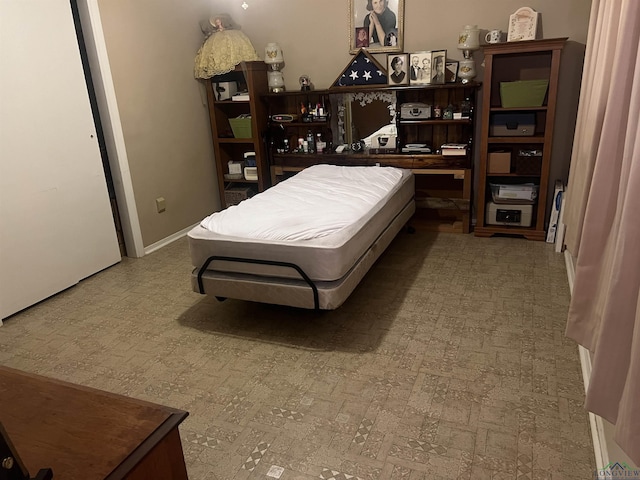 305 E Maple St, White Oak, TX 75693 - bedroom featuring baseboards