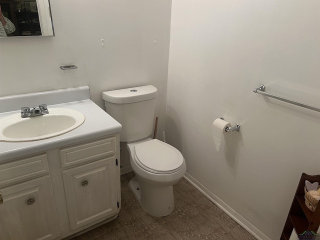 305 E Maple St, White Oak, TX 75693 - bathroom with toilet and vanity
