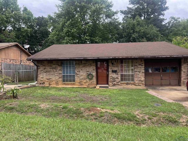305 E Maple St, White Oak, TX 75693 - ranch-style house featuring brick siding, an attached garage, and roof with shingles