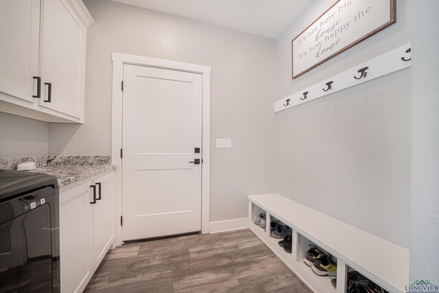 mudroom with dark wood-type flooring and washer / clothes dryer