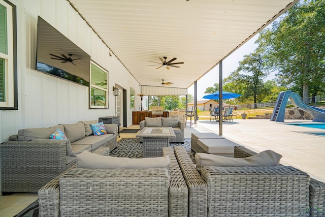 view of patio / terrace featuring outdoor lounge area and ceiling fan