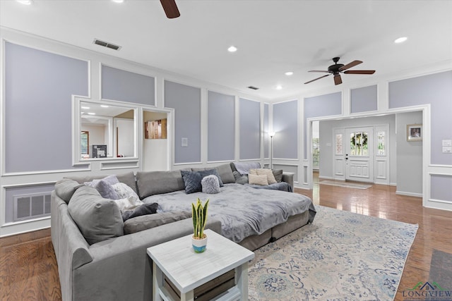 1312 Enchanted Ln, Longview, TX 75604 - living area with a decorative wall, a ceiling fan, ornamental molding, recessed lighting, and wood finished floors