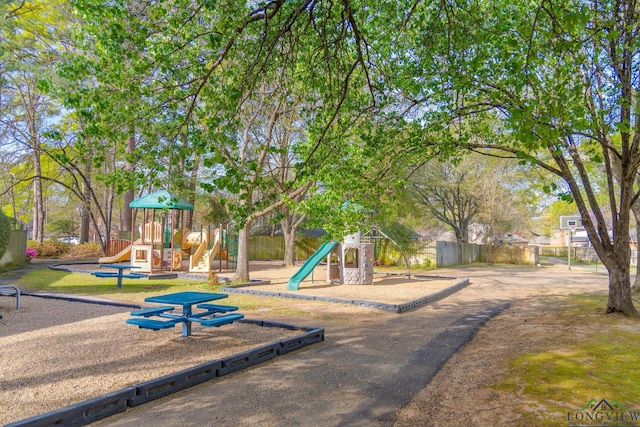 community play area featuring fence