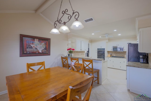 dining space featuring ornamental molding, recessed lighting, light tile patterned floors, visible vents, and ceiling fan