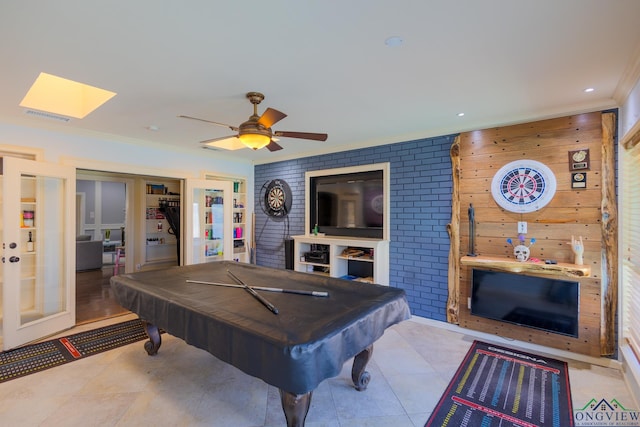 rec room featuring billiards, french doors, visible vents, a skylight, and ceiling fan