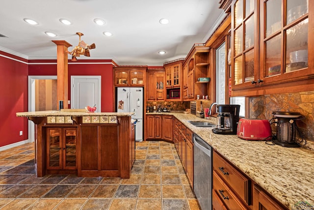 kitchen featuring dishwasher, white refrigerator, crown molding, and sink