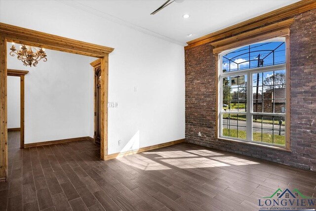 501 S Harrison St, Longview, TX 75601 - unfurnished room with wood finished floors, baseboards, crown molding, a chandelier, and recessed lighting
