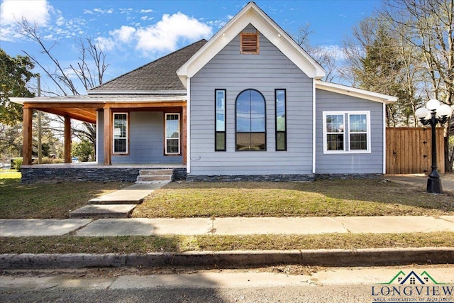 501 S Harrison St, Longview, TX 75601 - view of front of home with a porch and roof with shingles