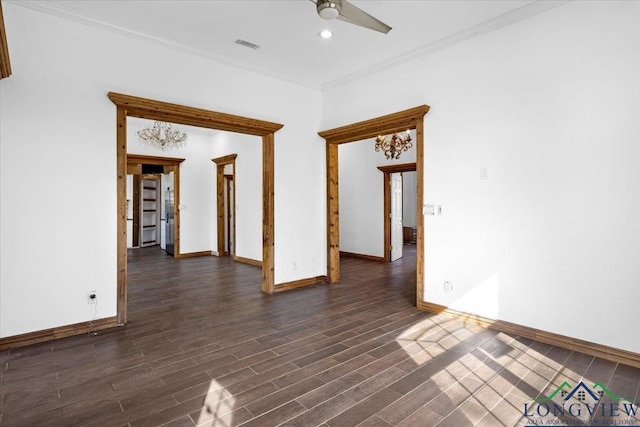 501 S Harrison St, Longview, TX 75601 - empty room with ceiling fan, baseboards, crown molding, dark wood-type flooring, and recessed lighting