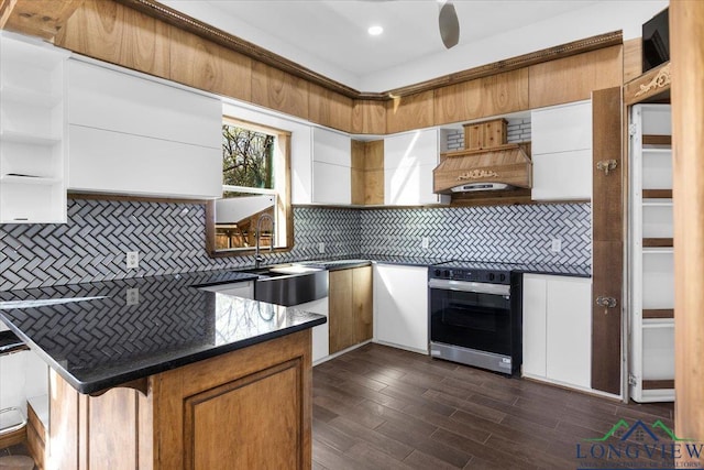 501 S Harrison St, Longview, TX 75601 - kitchen featuring black range with electric stovetop, a sink, decorative backsplash, open shelves, and recessed lighting