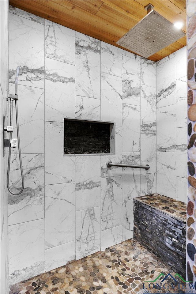 501 S Harrison St, Longview, TX 75601 - bathroom with tiled shower and wood ceiling