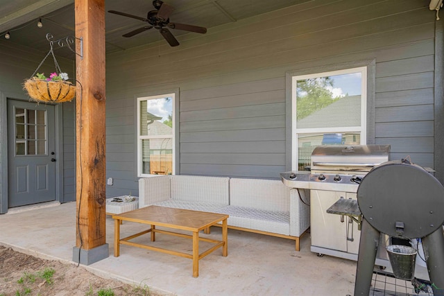 view of patio featuring a grill and ceiling fan
