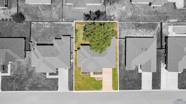 birds eye view of property with a residential view