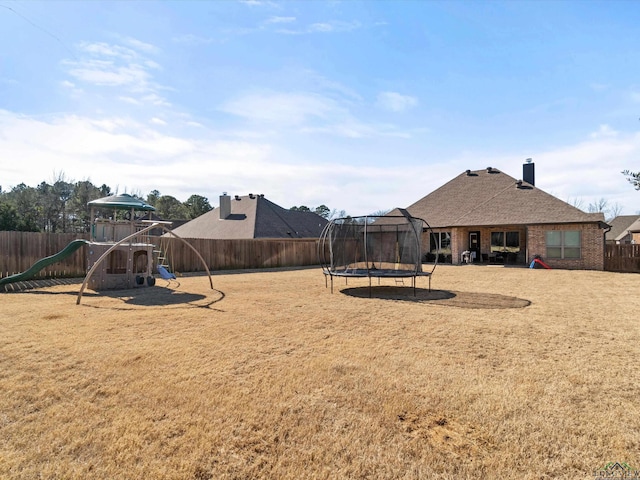 view of play area with a trampoline