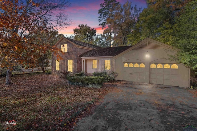 view of front of home with a garage