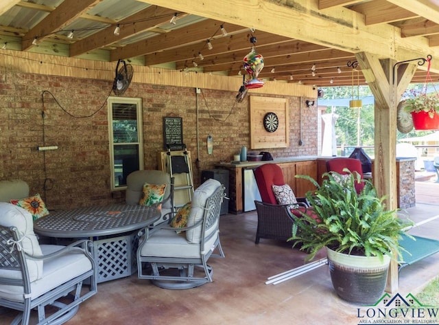 view of patio with a bar