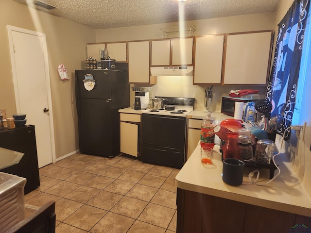 kitchen featuring white cabinetry, black fridge, electric stove, and a textured ceiling