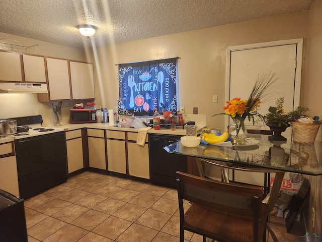 kitchen with black appliances, white cabinets, sink, light tile patterned floors, and a textured ceiling