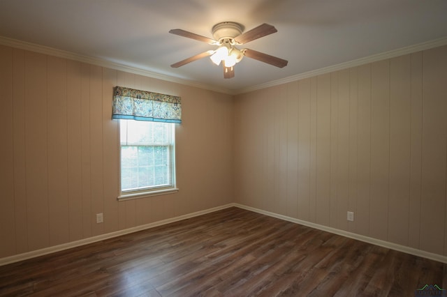 1302 Jeff Davis Dr, Tyler, TX 75703 - empty room featuring dark wood finished floors, a ceiling fan, and ornamental molding