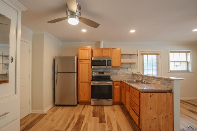 1302 Jeff Davis Dr, Tyler, TX 75703 - kitchen featuring appliances with stainless steel finishes, light wood-style floors, crown molding, open shelves, and ceiling fan