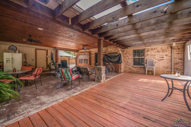 1901 Azalea St, Gilmer, TX 75644 - deck featuring a pergola, outdoor dining area, ceiling fan, and fence