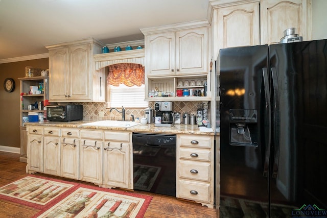 1901 Azalea St, Gilmer, TX 75644 - kitchen with a sink, light wood-style floors, backsplash, open shelves, and black appliances