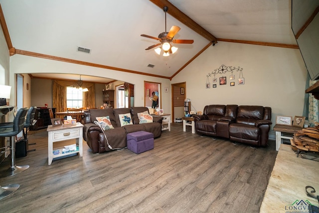 1901 Azalea St, Gilmer, TX 75644 - living area with beamed ceiling, wood finished floors, visible vents, and ceiling fan with notable chandelier