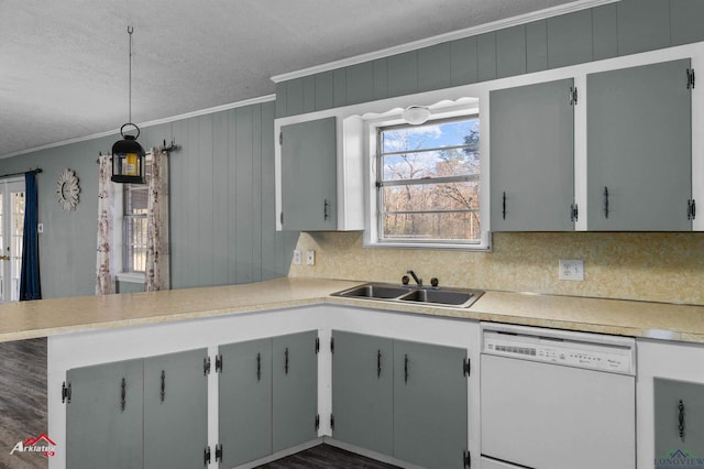 kitchen with decorative light fixtures, white dishwasher, gray cabinets, and sink