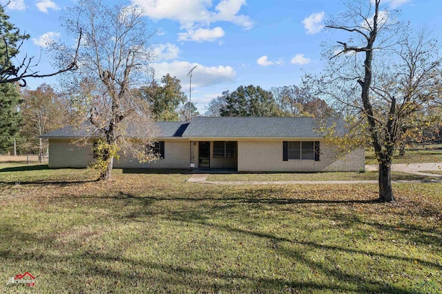 ranch-style house with a front yard