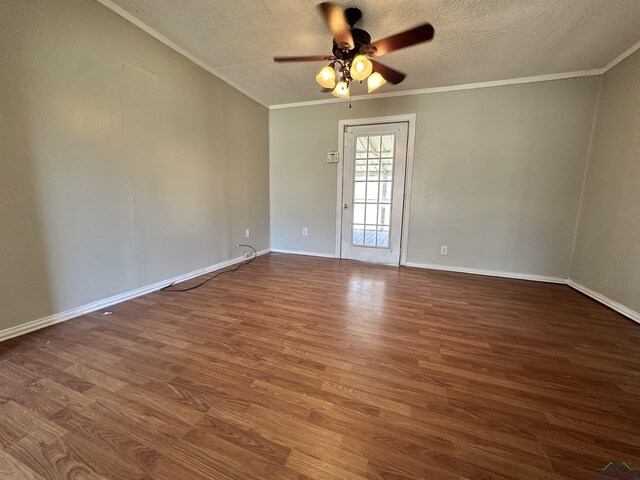 587 Floyd Evans Rd, Marshall, TX 75672 - empty room with wood finished floors, a textured ceiling, ceiling fan, and crown molding