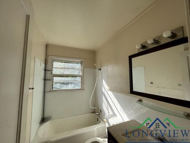 full bathroom featuring vanity, toilet, and shower / tub combination