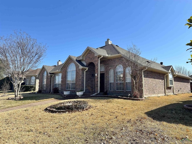 view of front of home with a front yard